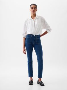 Fit: A slim, ankle-length classic.  More room than our True Skinny, but just as comfortable.  Fabric: 86% Cotton, 7% Recycled Materials, 5% Polyester.  Stretch: Stretch Jeans.  A bit of hug & a lot of hold.  Comfortable & designed to flatter.  Rise: Mid Rise Jeans.  Look: A classic four-pocket jean in dark indigo wash.  Details: Zip fly, patch-pocket styling & holds-you-in front pockets.  Responsibly Made: This pair of jeans is part of our water-saving Washwell program.  Compared to conventional wash methods, Washwell has saved millions of liters of water since 2016.  Our Mid Rise Jean has a 10" 25cm) rise.  Fitted through the hip & thigh.  Slim leg.  Ankle-length jeans.  13. 25" 34 cm) leg opening. ​ Inseam: Petite 25. 5" 65 cm), Short 26" 66 cm), Regular 27. 5" 70 cm), Long 29. 5" 75 cm) Gap Relaxed Fit Jeans For Workwear, Gap Everyday Straight Leg Pants, Classic Fitted Gap Bottoms, Gap Classic Mid-rise Bottoms, Classic Mid-rise Gap Bottoms, Classic Mid-rise Bottoms By Gap, Classic Gap Jeans For Spring, Gap Fitted Jeans For Fall, Chic Straight Leg Gap Jeans