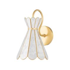 a gold and white glass wall light with an elegant design on the front, hanging from a brass - plated metal hook