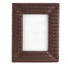 a brown leather frame with an empty white space in the center for text or image