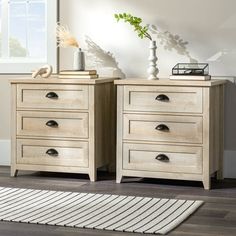 two wooden drawers sitting next to each other on top of a hard wood flooring