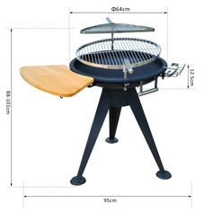 an outdoor bbq grill with a wooden table top and umbrella on it's side