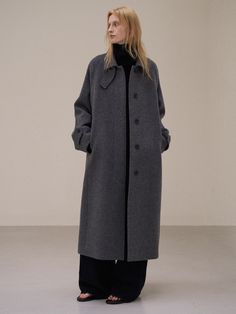 Editor's Notes Woven from wool and cashmere blend fabric, this maxi length coat has an oversized silhouette with hidden buttons and lined design. - Wool and cashmere blend fabric- Maxi length- Oversized silhouette- Hidden button fastenings through front- LinedMeasurements(in.)Size (S/M/L)- Length: 45.28 in / 45.67 in / 46.06 in - Bust: 22.05 in / 22.83 in / 23.62 in- Sleeve length: 31.89 in / 32.28 in  / 33.07 in - Sleeve hem: 6.30 in / 6.50 in / 6.69 in- Hem: 25.39 in / 26.18 in / 26.97 in * Model info: Height 5' 9, wearing size M Composition & Care- 95% Virgin wool, 5% Cashmere - Dry Cleaning  Designer- by FACADE PATTERN Wool Coat Outfits, Vintage Winter Coat, Facade Pattern, Long Grey Coat, Duffel Coat, Long Peacoat, Gray Wool Coat, Pea Coats Women