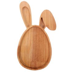 a wooden plate with an animal shaped cut out of it's face and ears