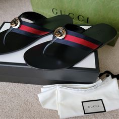 Gucci Blue Red Web Sandals Men Size 14. Gucci Designer Leather Slides, Gucci Designer Flat Sandals, Red Gucci Sandals For The Beach, Designer Sandals With Red Sole And Round Toe, Designer Sandals With Red Sole For Summer, Gucci Designer Sandals With Red Sole, Gucci Leather Sandals With Red Sole, Flat Gucci Sandals With Red Sole, Designer Gucci Slides