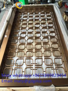 the metal grate is ready to be put into the box for making an oven