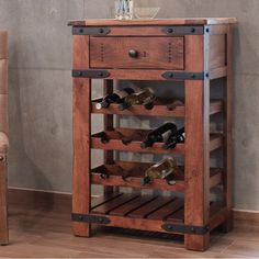 a wooden wine rack sitting next to a chair