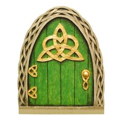 an image of a green door with gold decorations on it's front and side