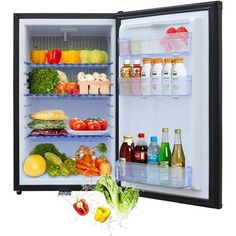 an open refrigerator filled with lots of different types of vegetables and fruits, including broccoli