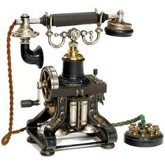 an old fashioned phone with two telephones attached to it