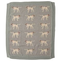 a gray blanket with dogs on it