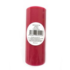 a roll of red colored paper on a white surface with a barcode printed on it