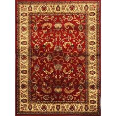 a red and gold rug with an ornate design on the bottom, in front of a white background