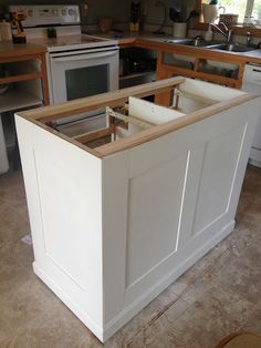 the kitchen cabinets are being built and ready to be installed