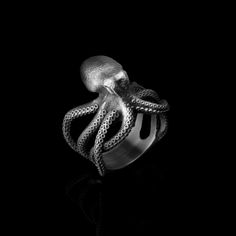 Dive into the depths of the ocean with our captivating sterling silver octopus ring. The intricate design features an octopus wrapping its tentacles around the ring, creating an eye-catching statement piece. Perfect for ocean enthusiasts, this unique ring showcases the beauty and mystery of marine life. ✦ Jewelry Specifications ✦ * Weight: grams * Finishes: Oxidized, Polished, Gold, Rose Gold * Material: 925 Sterling Silver * Hallmark: 925 * Customization: Available in 8K, 10K, 14K, and 18K whit Octopus Ring, Life Jewelry, Tarnished Jewelry, Ocean Jewelry, Tarnished Silver, Sea Creature, Wrap Ring, Wrap Rings, Silver Pieces