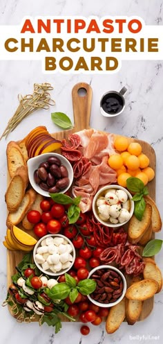 an assortment of different types of food on a cutting board with the words antipasto charcuterie board