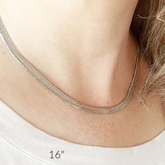 "Introducing the Stainless Steel Herringbone Chain Necklace! This elegant necklace features pointed links that interlock to form a unique eye-catching design. The fluid design and flat construction allow this chain to lay smoothly against the chest so it will stay in place when worn. It is best worn as a stand-alone statement piece and pairs well with any ensemble from business casual to your everyday style. So whether you treat yourself or gift to a loved one, this necklace is a must-have piece for anyone with an eye for fabulous fashion and sleek style!  Available in: 14\" 16\"  18\" 20 24\" (not shown) Model is 5'3\" and 120lbs. --------------------------------------------------------------------- FEATURES: - Stainless Steel Chain is strong, durable, and doesn't easily break. - 316L Sur Mens Necklace Chain, Mountain Necklace, Fluid Design, Mens Necklace, Herringbone Chain, Mens Chain Necklace, Sleek Style, Elegant Necklace, Recycled Silver