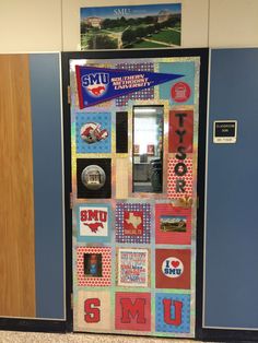 a door decorated with pictures and magnets on the front doors to an office building