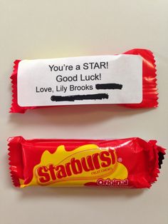 two candy bars with the words you're a star and good luck written on them