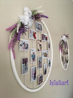 a circular wall hanging with pictures and flowers on it