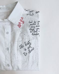 a white shirt with writing on it