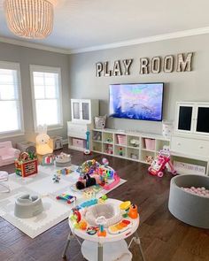 a child's play room with toys and decor