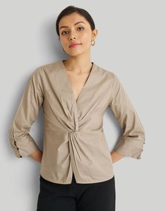 This Front Twist Top is made from organic cotton poplin to give your day a crisp, clean look. The gentle twist and full sleeves complete the shirt. Fabric:100% Organic Cotton Size Guide: Seeherethe size guide for this item. Materials: There is no use of elastic, virgin polyester or other non-biodegradable materials in this garment.Our sewing thread is also 100% biodegradable cotton. This garment is free from harmful chemicals and dyes and is safe for your skin. We use Oekotex® and bluesign® appr Front Twist Top, Clean Look, Knot Top, Twist Top, Full Sleeves, The Shirt, Cotton Poplin, Full Sleeve, Chic Outfits