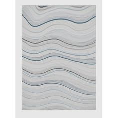 a white rug with wavy lines on it