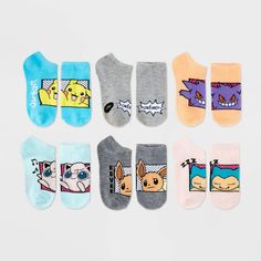 six pairs of socks with cartoon characters on them