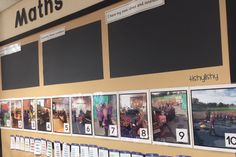 there are many pictures on the wall in this school room that is decorated with numbers