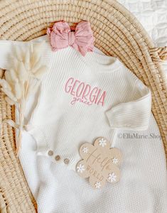 Introducing our Personalized Chunky Knit Oversized Sweater, a perfect blend of warmth and style for your little bundle of joy.  This sweater holds your little one in softness, ensuring snug comfort during chilly days. What sets it apart is the personal touch - a beautifully embroidered personalized name that adds a special charm to this already adorable piece.  Embrace the warmth and cherish the memories with this unique, customized sweater.  The perfect addition for your little addition.  Use i Personalized Baby Sweater, Personalized Cute Crew Neck Sweater, Personalized Pink Crew Neck Sweater, Personalized Pink Long Sleeve Sweater, Customizable Cute Winter Sweater, Cute Customizable Winter Sweater, Personalized Pink Sweater For Winter, Personalized White Cotton Sweater, Personalized White Sweater For Winter