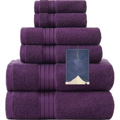 purple towels stacked on top of each other