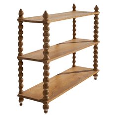 an old wooden shelf with three shelves on each side