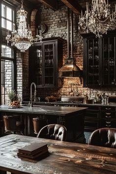 an old fashioned kitchen with black cabinets and chandelier hanging from the brick ceiling