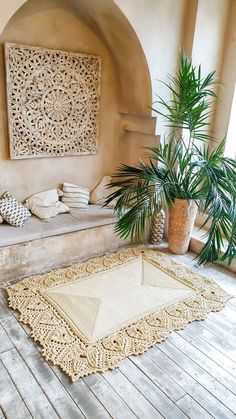 a living room filled with lots of furniture and plants