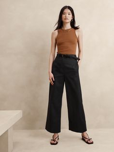 We designed these cropped wide-leg pants with warm weather in mind, cutting them from a softly structured twill made from breathable cotton and silky modal.  We added an adjustable slider belt, trouser creases and a wide-hem detail for a utilitarian twist.  High rise (11. 25"), wide leg.  Cropped length.  Zip fly with hook-and-bar closure.  Slider belt with snap closure.  Front and back pockets.  Unlined.  High rise (11. 25"), wide leg.  Cropped length.  Inseams: Petite/Short 23. 5", Regular 25. Adidas Samba Outfit, Linen Pants Outfit, Trouser Outfit, Cropped Wide Leg Pants, Petite Shorts, Wide Leg Cropped Pants, Casual Work Outfits, Fall Sweaters, Mode Inspiration