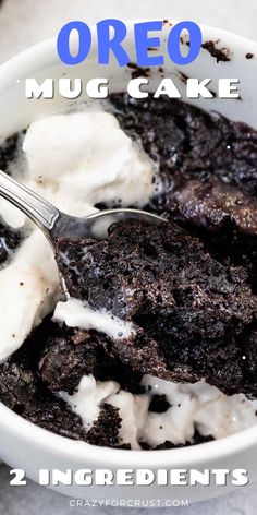 a close up of a bowl of pudding with ice cream on top and the words oreo mug cake above it