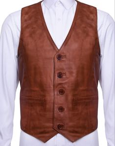 New Mens Womens Boots Luggage Men's Classic Smart Tan 100% Soft Leather Waistcoat Vest Gilet A simple yet beautifully designed waistcoat crafted from butter soft Nappa leather. This garment features a smart shirt collar that is complimented by a 5 button front fastening. For added practicality this boasts a single chest pocket and includes a belt at the rear to provide a more customised fit. This waistcoat is perfect for smart or casual wear and is available in other colours. Nappa Leather 2 Ext Leather Vest Mens, Md Fashion, Leather Vests, Leather Garments, Biker Wear, Brown Leather Coat, Men's Vests, Leather Craft Projects