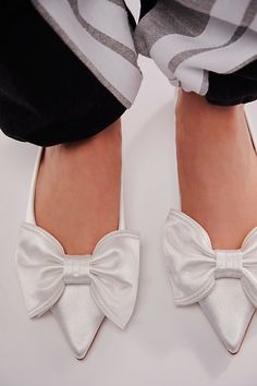 Femme to the max, these pointed-toe ballet flats from Jeffrey Campbell feature an oversized bow detail for super sweet styling. **Features:** Slip-on style, metallic uppers, pointed toe, giant bow applique, flat sole **Why We | Bella Bow Flats by Jeffrey Campbell at Free People in White, Size: US 8 Comfortable Bridal Shoes, Upcoming Fashion Trends, Giant Bow, Bow Applique, Bridal Flats, Flirty Tops, Bridal Shoes Flats, Wedding Shoes Flats, Wedding Flats