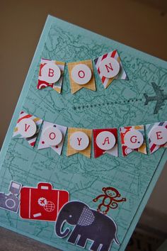 a handmade greeting card with the word bon voyage written in red, white and blue