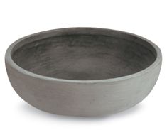 a gray bowl sitting on top of a white table