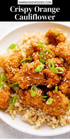 crispy orange cauliflower served over rice on a white plate with green onions