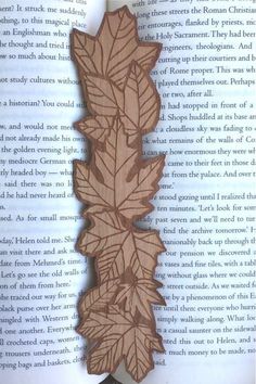 an image of a book with some leaves on it