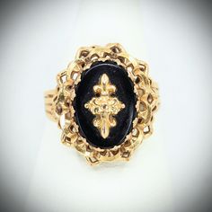 "TAKE ADVANTAGE OF OUR $100 DISCOUNT ON THIS BEAUTIFUL ITEM  UNTIL OCT. 28th Important: A description is available following the details. Please, read on. Thank you: DETAILS: Material: 18K solid gold, onyx Size: 7 1/4  Weight: 5.9g Period: 19th cent. France Origin: France Provenance: The estate sale of Madame D. Condition: excellent vintage Additional remarks: the ring has been stamped with the official 18K mark.  It also shows traces of a maker's stamp. N.b.: We guarantee the authenticity of our items. Each one of them has been evaluated by our experts and checked by our competent jeweler. DESCRIPTION: This is not your ordinary signet ring.  Crafted in 18K solid gold it features a lovely onyx plaque decorated with a double fleur de lys.  It has a unique prong set and a sophisticate galler Formal Gold Cabochon Signet Ring, Elegant Black Enamel Engraved Ring For Formal Occasions, Elegant Formal Engraved Ring With Black Enamel, Gold Onyx Jewelry For Anniversaries, Heirloom Gold Signet Ring With Cabochon, Victorian Gold Signet Ring For Formal Occasions, Heirloom Black Signet Ring For Formal Occasions, Gold Heirloom Signet Ring With Cabochon, Heirloom Black Enamel Signet Ring For Formal Occasions