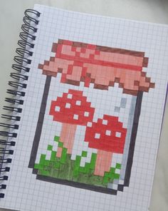 a drawing of a mushroom in a jar on top of a notepad, next to a cup of coffee