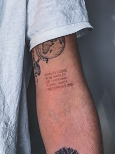 a person with a tattoo on their arm