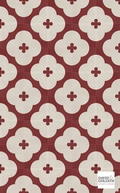 a red and white wallpaper with an abstract design in the middle, on top of it