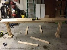 the table is being built and ready to be used as a workbench or bench