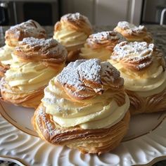 a white plate topped with lots of pastries