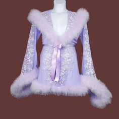 Trashy Lingerie Womens Lilyrose Lavender Feather Trim Short Hooded Robe Size M Trashy Lingerie Lilyrose Feather Trim Short Hooded Mesh Robe In Lavender. Marabou Trim. Hooded Robe. Floral Applique. Ribbon Bow Detail. Front Hook Closure. Glamor Fairy Boudoir Lingerie Dress Up Robe. No Stains Or Holes, But Does Have A Some Marks On Bow (See Last Pic). Size: M Length: 31.5" Pit To Pit: 17.5" Waist: 12.5" Shortest Sleeve: 23" Longest Length: 30" Condition: Pre-Owned, Great Box L D/16/13pm Mesh Robe, Queen Aesthetic, Hooded Robe, Feather Trim, Lingerie Dress, Sleepwear Robe, Floral Applique, Ribbon Bow, Bow Detail