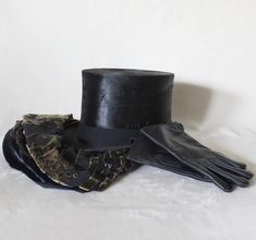 "Antique Beaver Felt Top Hat From rock and roll to Royal ascot, top hats are always in style.  This beautifully preserved top hat was made by Linney of London for Jess Applegath and sons, for a client believed to be around the 1950s.  The hat size would fit a small head for men or women.  The black beaver felt hat shows very well and the inside silk lining is also in great shape.  Overall this top hat is a great find, you would surely stand out at any special event.  Hat Size: 7 or 22\" or 56 cm" Cyberpunk Jacket, Steampunk Top, Steampunk Top Hat, Victorian Wedding, Boho Maxi, Wedding Gowns Vintage, Victorian Clothing, Royal Ascot, Felt Hat